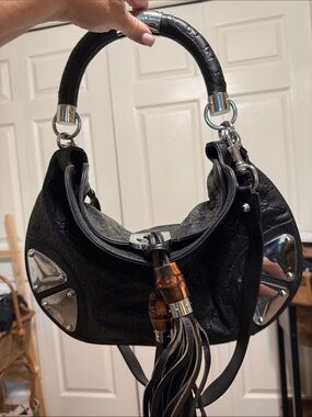 Collectible fabulous Gucci Black Leather Tassel Hobo with Silver Accent high end